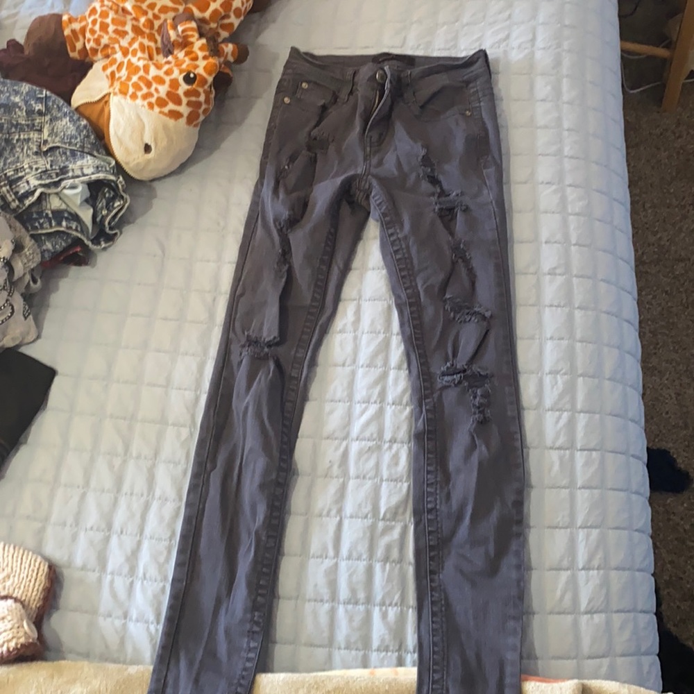 Light washed ripped grey jeans worn only twice
